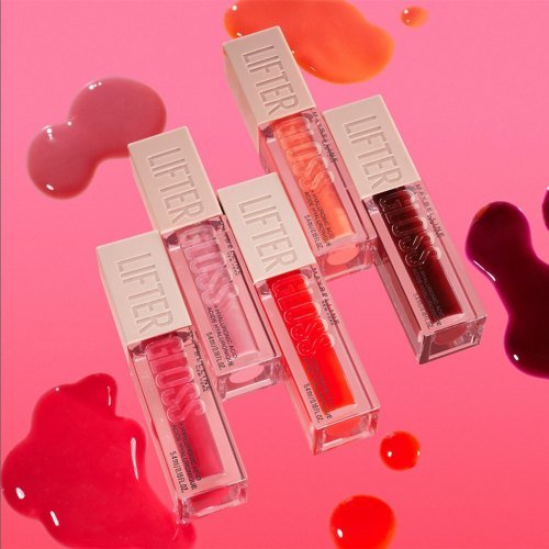 5 lifter gloss da maybelline de cores diferentes em fundo rosa